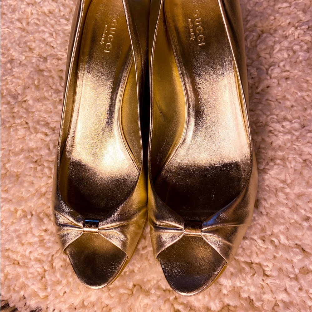 Gucci gold wedge sandals logo to the back